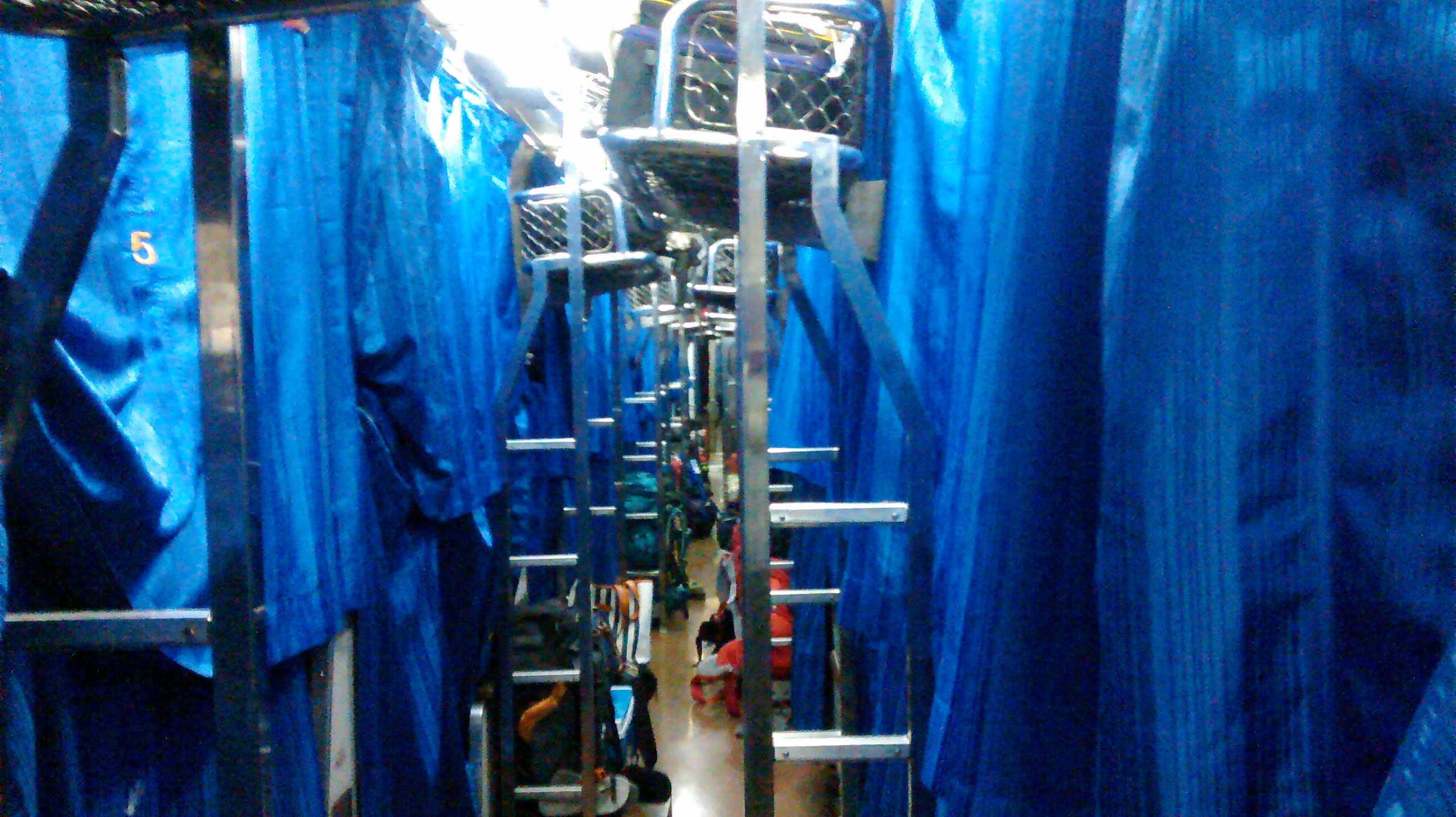 The bunks on the sleeper train. The train is set up very cleverly. There are two seats facing into each other in each section which fold down to one bed and then another bed folds down from the top for the bunk.