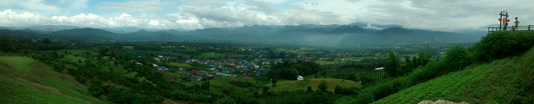 The top of a hill overlooking the village. There's a viewing point where you get free tea with your entry ticket.